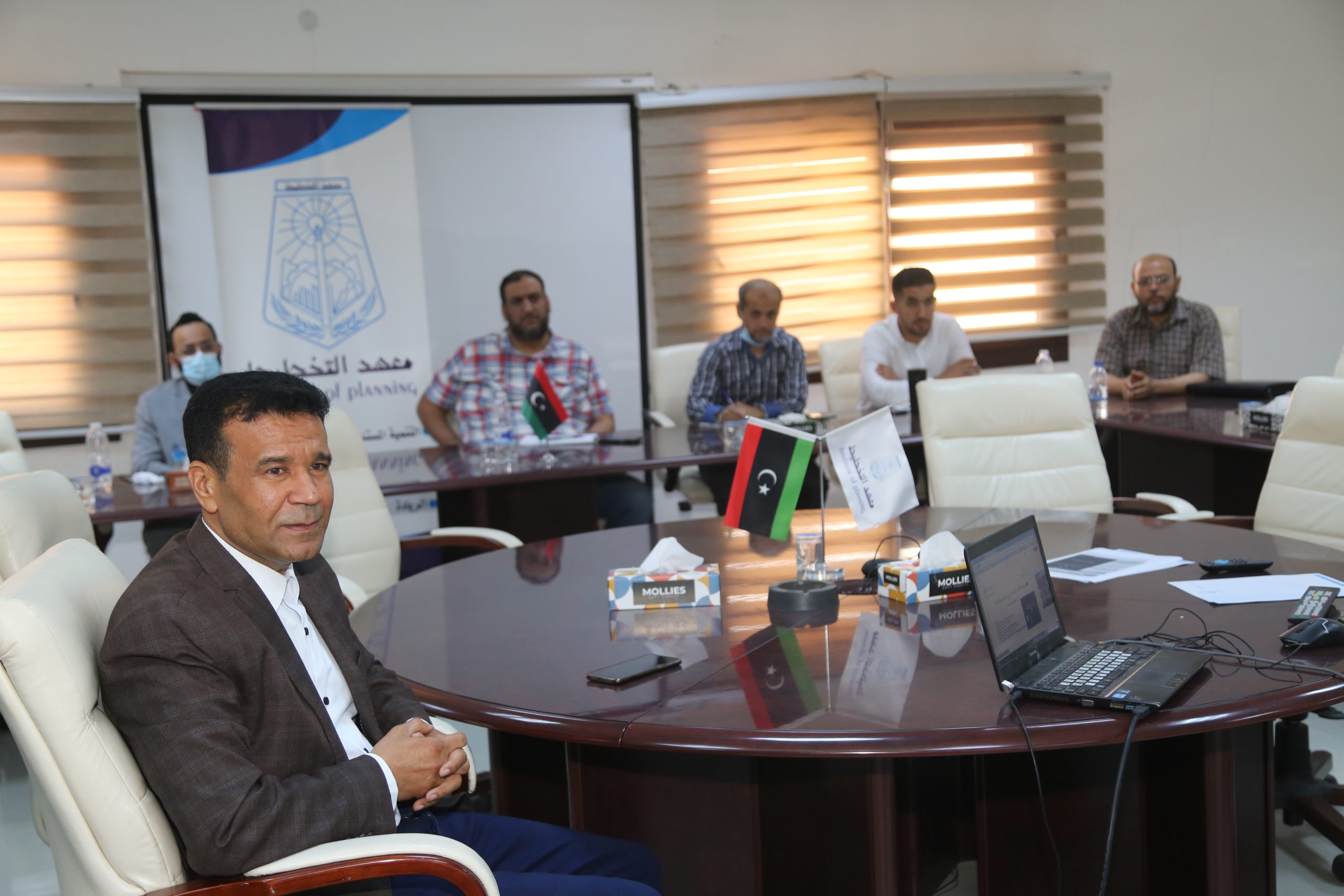 محاضرة علمية حول أخلاقيات الذكاء الاصطناعي في البيئة المالية الرقمية بمعهد التخطيط